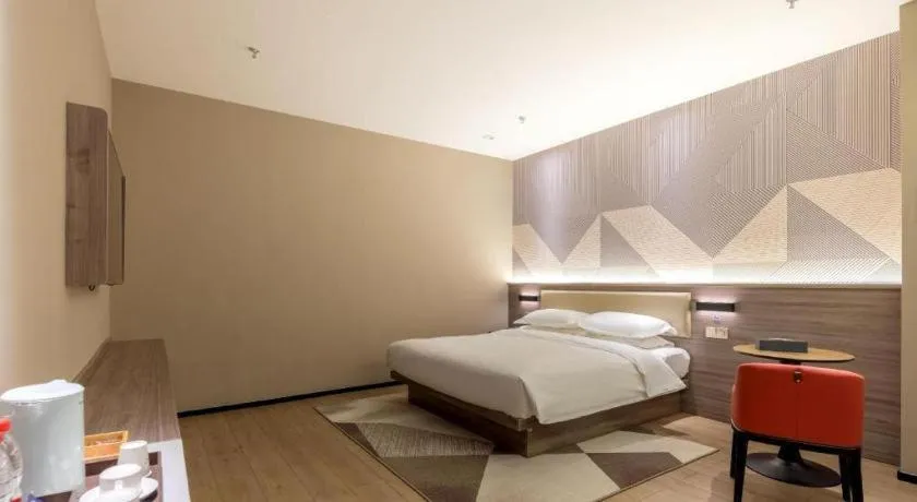 Bed in Borrman Hotel Korla Peacock River