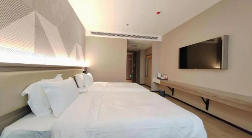 Bed in Borrman Hotel Korla Peacock River