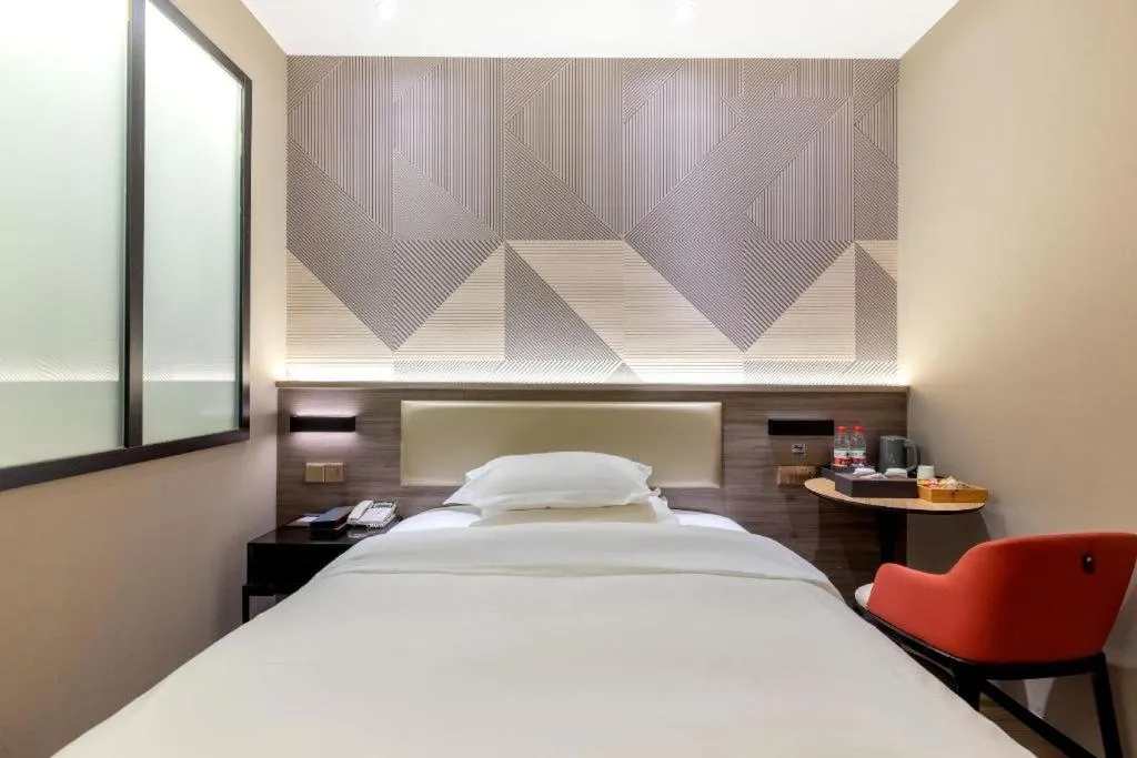 Bed in Borrman Hotel Korla Peacock River