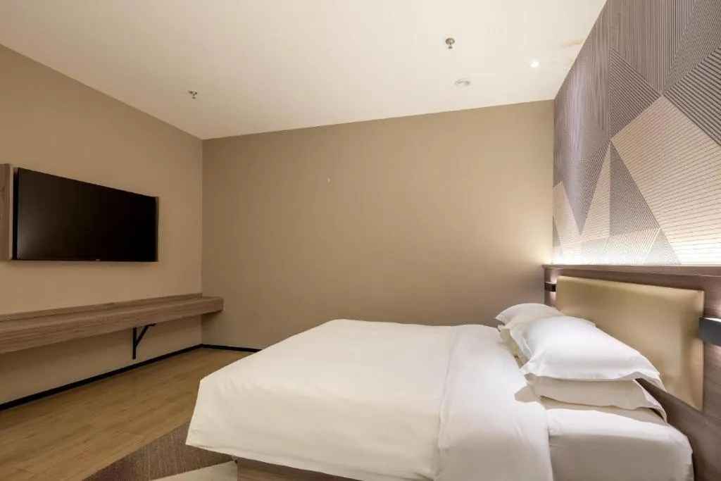 Bed in Borrman Hotel Korla Peacock River