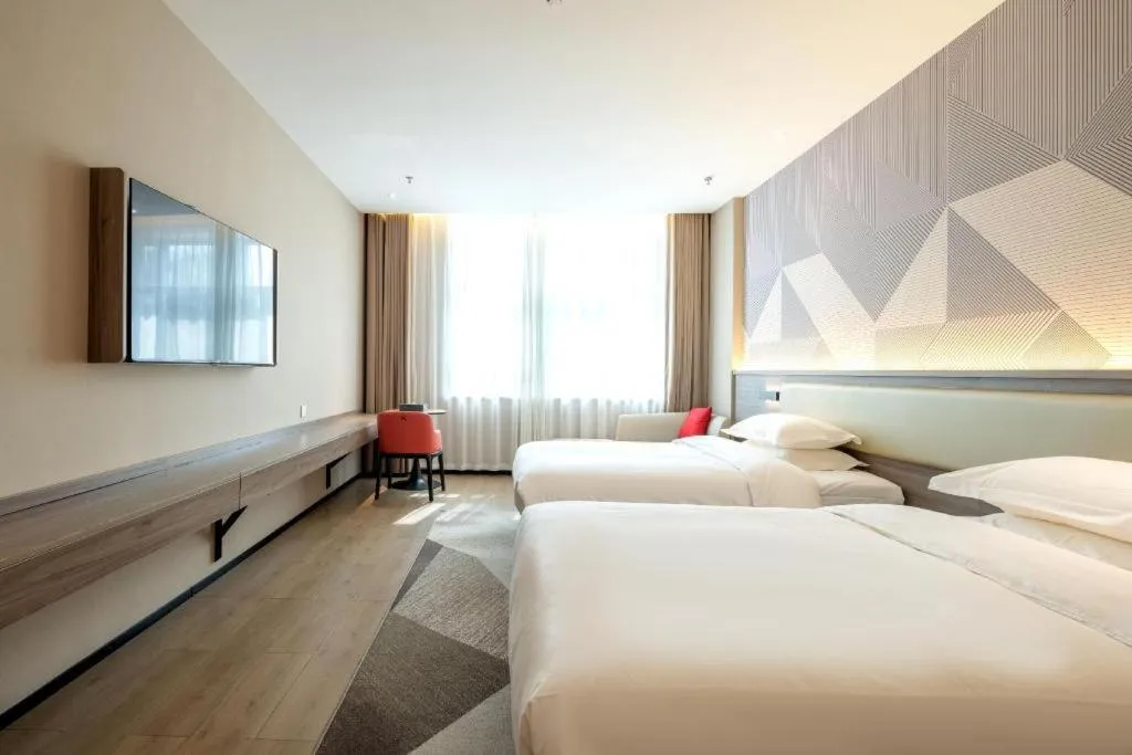 Bed in Borrman Hotel Korla Peacock River