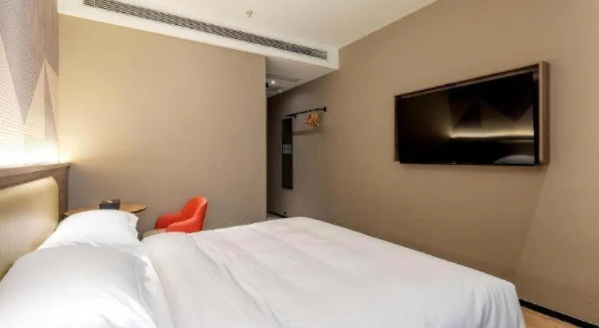 Bed in Borrman Hotel Korla Peacock River