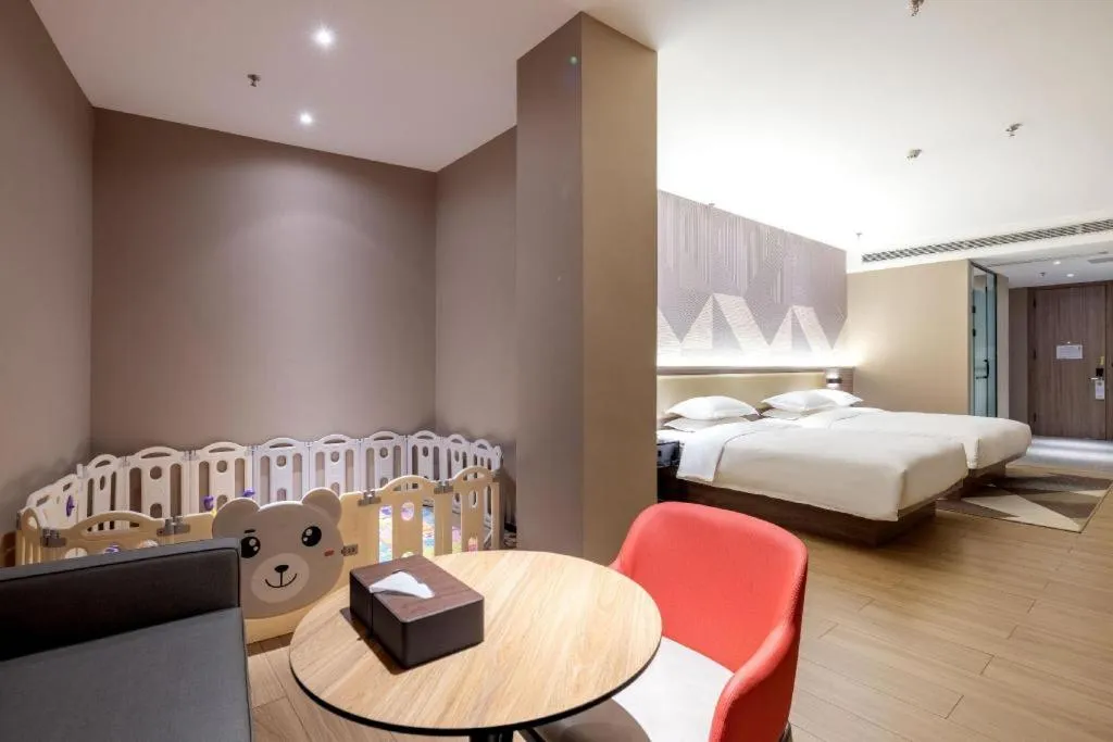 Bed in Borrman Hotel Korla Peacock River