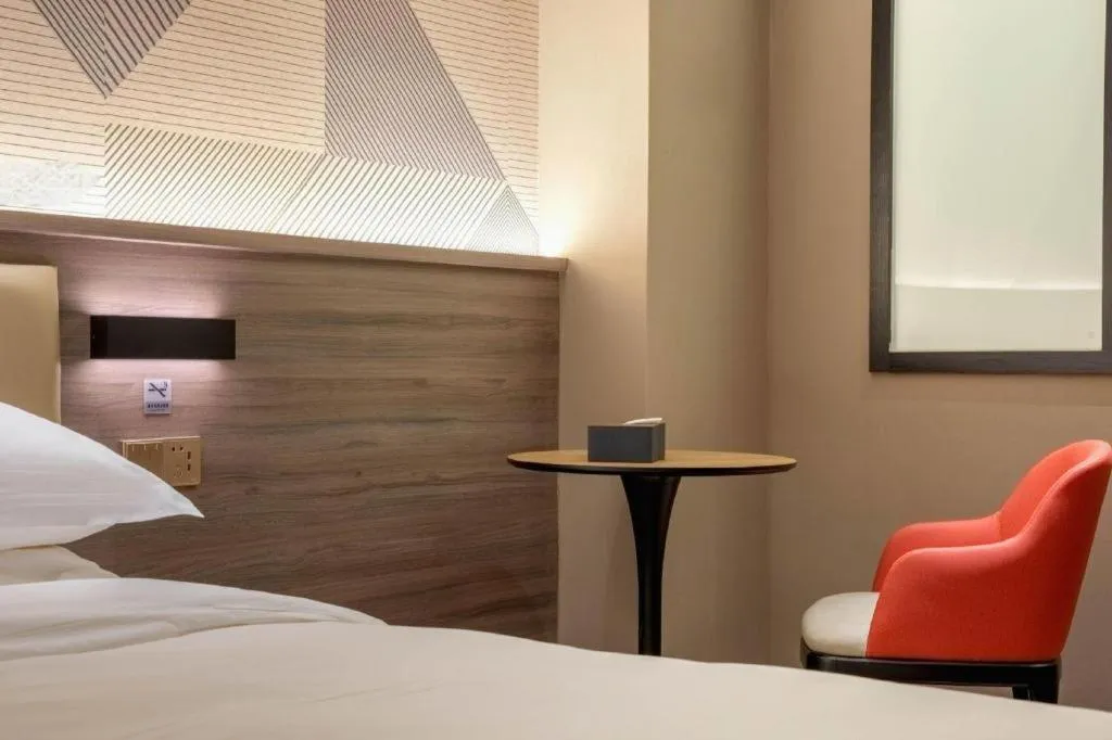 Bed in Borrman Hotel Korla Peacock River