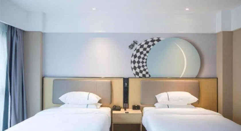 Bed in City Comfort Inn Badong Passenger Transport Center