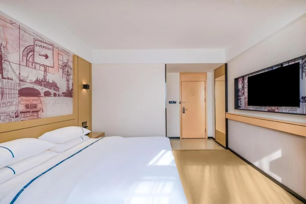 Bed in City Comfort Inn Huize Ancient City