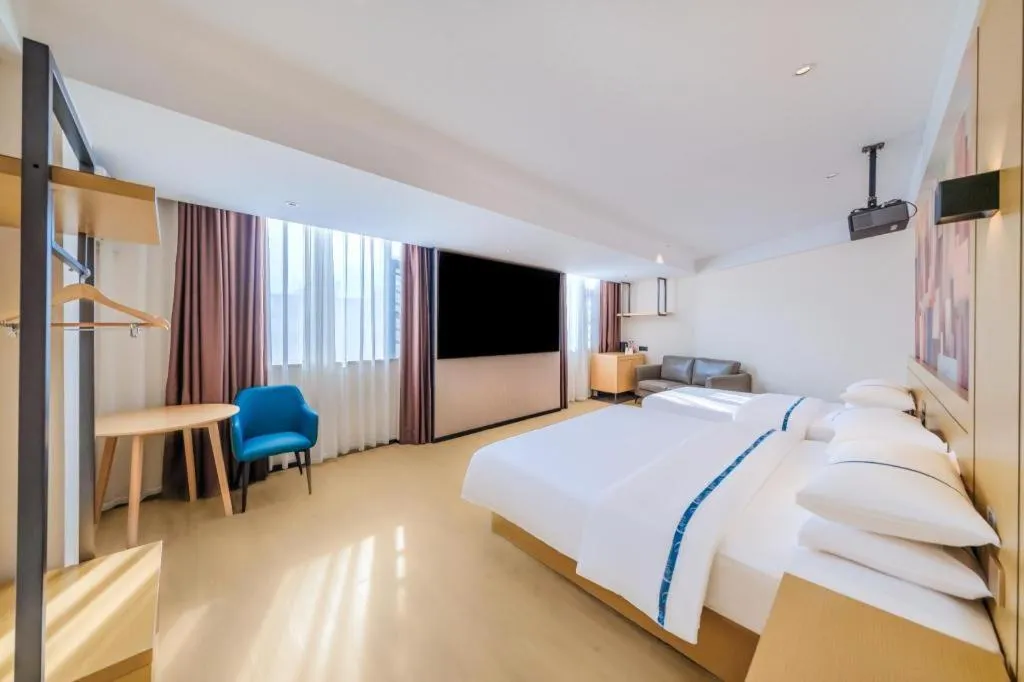 Bed in City Comfort Inn Huize Ancient City