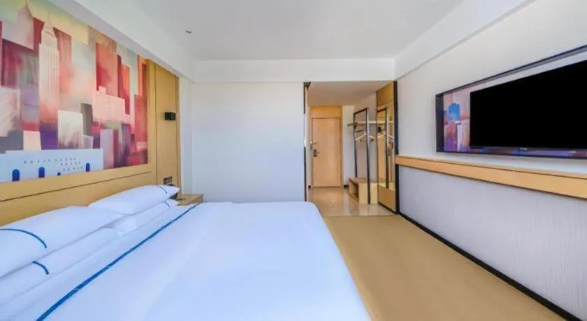 Bed in City Comfort Inn Huize Ancient City