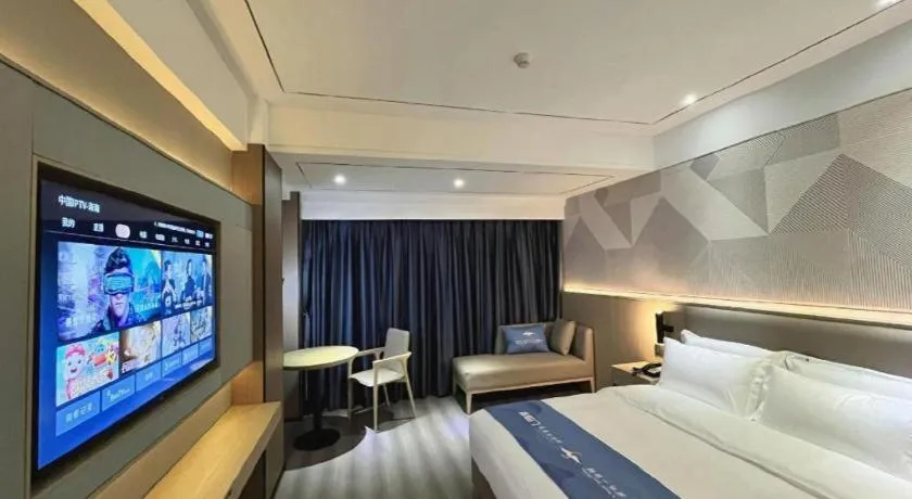 Bed in Borrman Hotel Wanning Wenming Road High-speed Railway Station