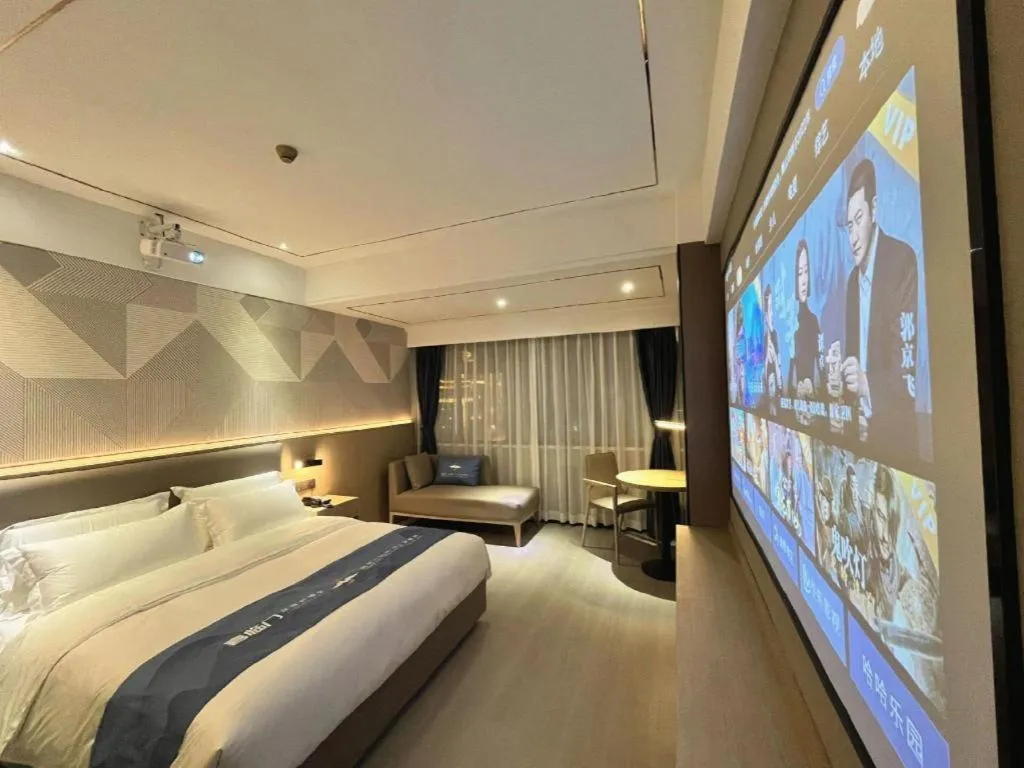 Bed in Borrman Hotel Wanning Wenming Road High-speed Railway Station