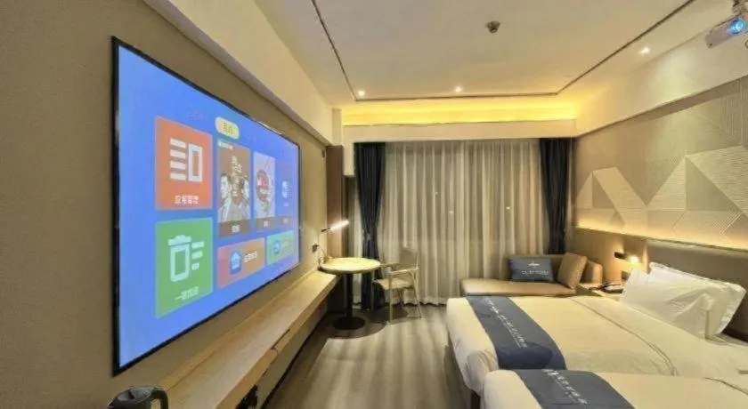 Bed in Borrman Hotel Wanning Wenming Road High-speed Railway Station