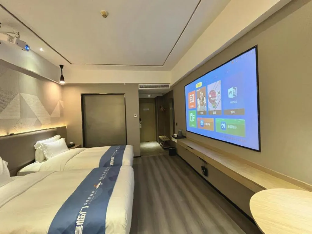 Bed in Borrman Hotel Wanning Wenming Road High-speed Railway Station