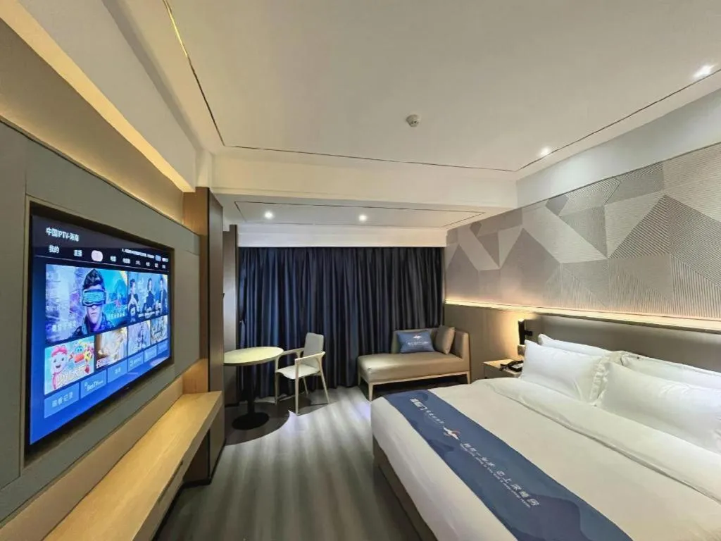 Bed in Borrman Hotel Wanning Wenming Road High-speed Railway Station