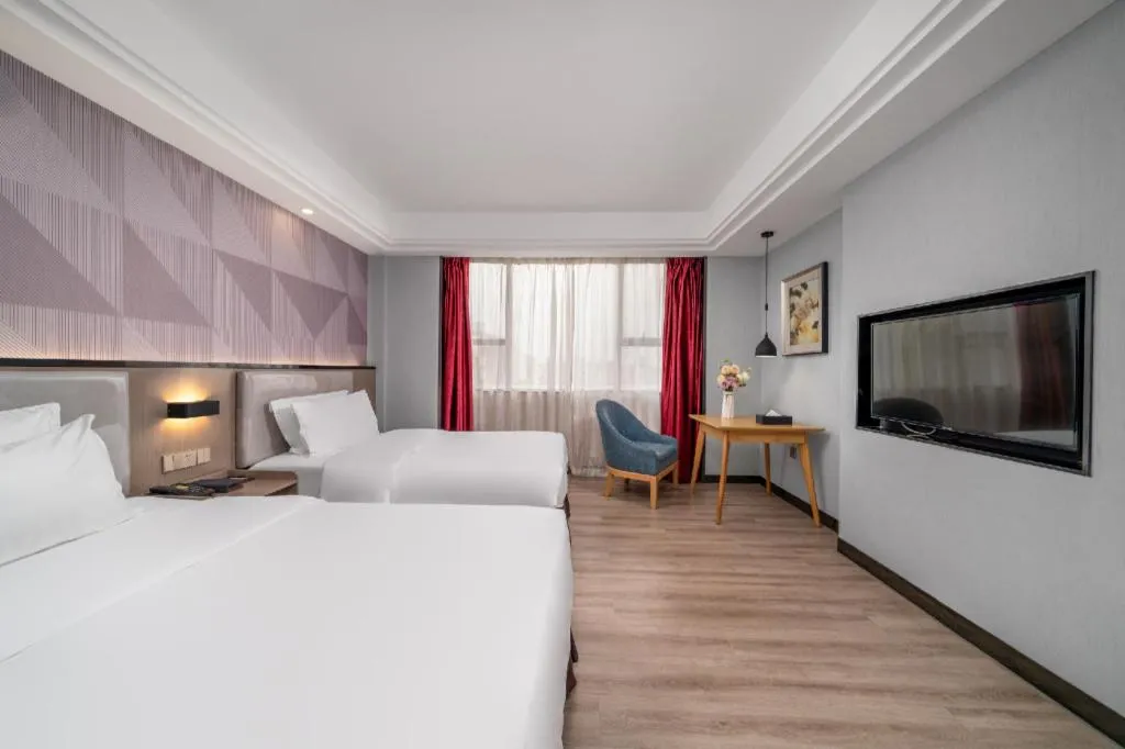 Bed in Borrman Hotel Guangzhou Xinshi Baixin Plaza Qifu Road