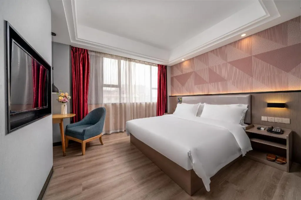 Bed in Borrman Hotel Guangzhou Xinshi Baixin Plaza Qifu Road