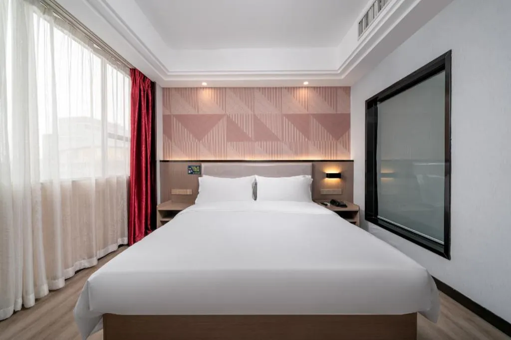 Bed in Borrman Hotel Guangzhou Xinshi Baixin Plaza Qifu Road