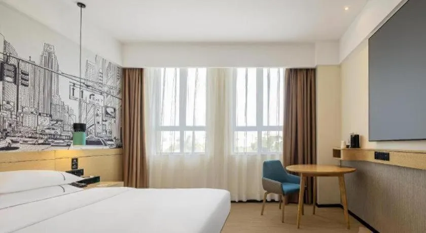 Bed in City Comfort Inn Shaorao Poyang