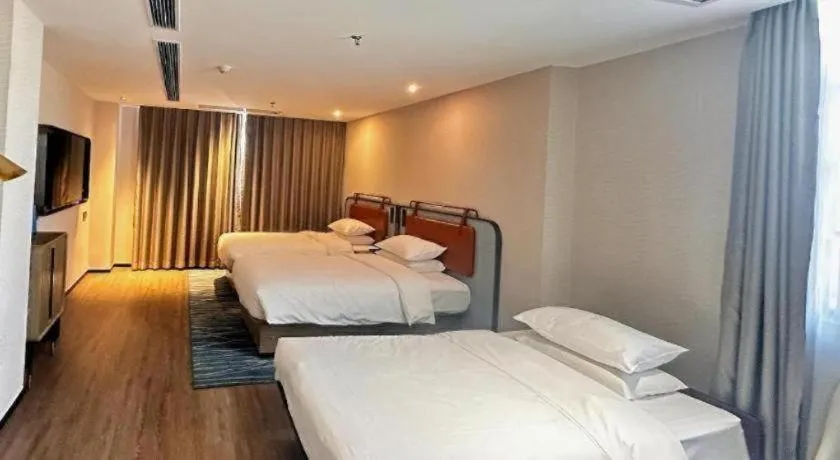 Bed in Echarm Hotel Guangzhou North Station Cultural Tourism City