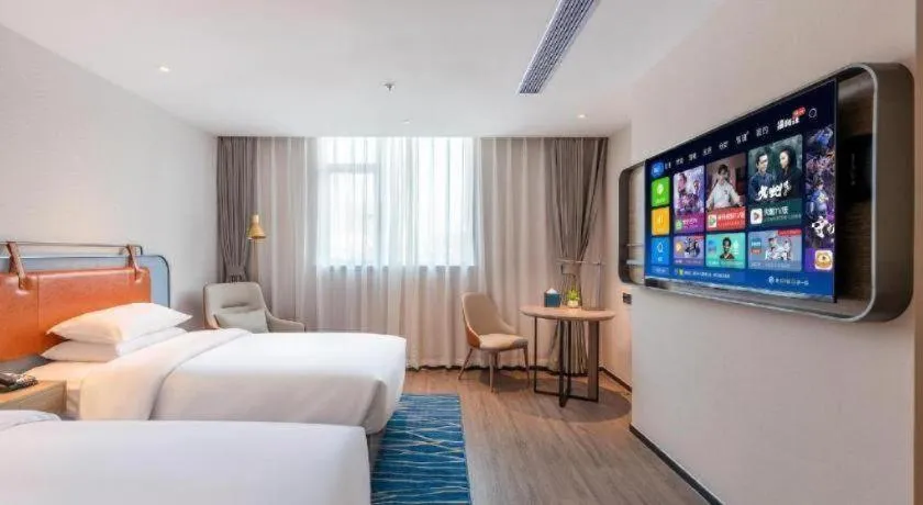 Bed in Echarm Hotel Guangzhou North Station Cultural Tourism City