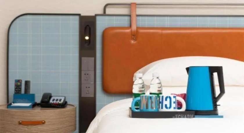 Bed in Echarm Hotel Guangzhou North Station Cultural Tourism City
