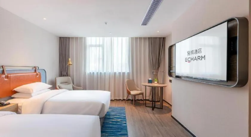 Bed in Echarm Hotel Guangzhou North Station Cultural Tourism City