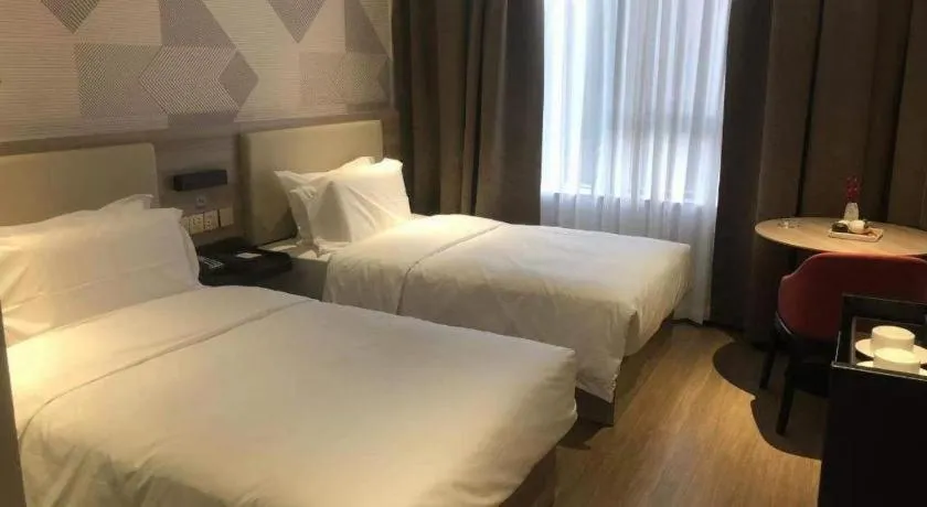 Bed in Borrman Hotel Suzhou Wujiang Zhongshan North Road Pedestrian Street