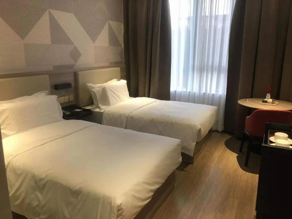 Bed in Borrman Hotel Suzhou Wujiang Zhongshan North Road Pedestrian Street