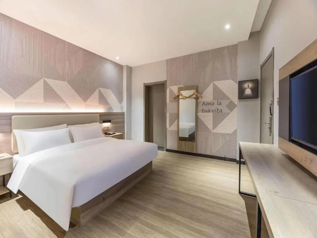Bed in Borrman Hotel Suzhou Wujiang Zhongshan North Road Pedestrian Street