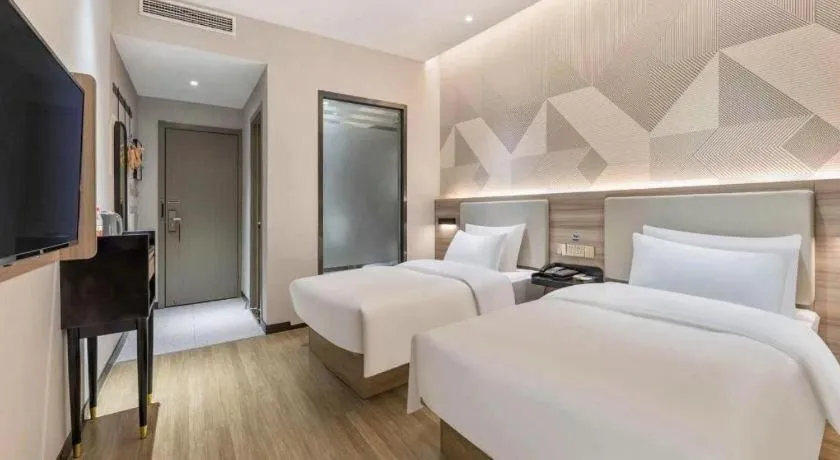 Bed in Borrman Hotel Suzhou Wujiang Zhongshan North Road Pedestrian Street