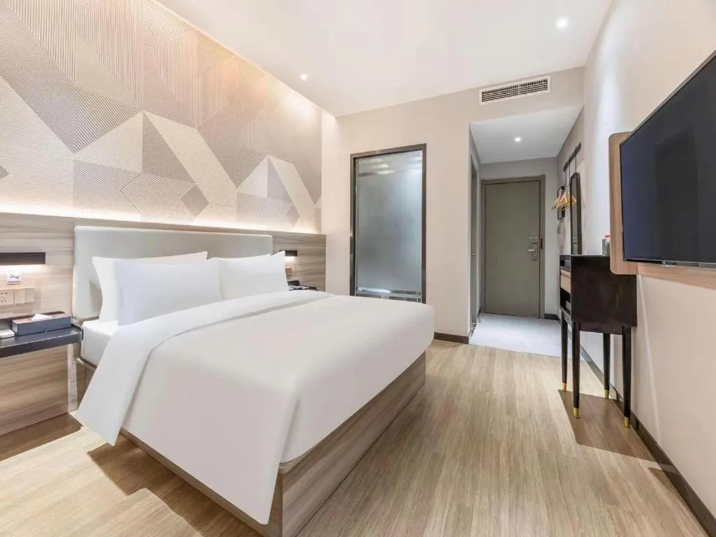 Bed in Borrman Hotel Suzhou Wujiang Zhongshan North Road Pedestrian Street