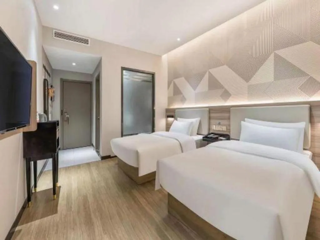 Bed in Borrman Hotel Suzhou Wujiang Zhongshan North Road Pedestrian Street