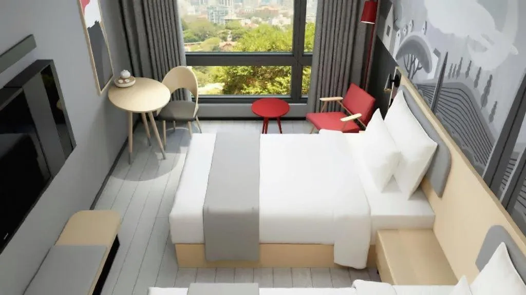 Bed in Borrman Hotel Suzhou Wujiang Zhongshan North Road Pedestrian Street