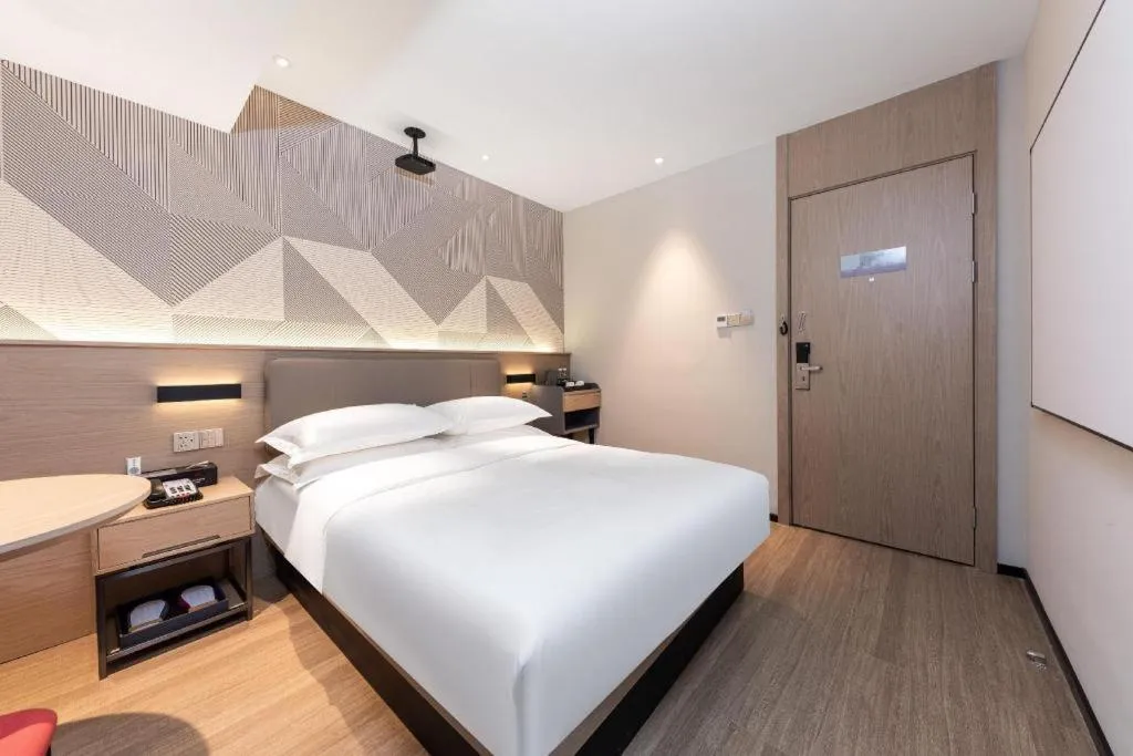 Bed in Borrman Hotel Wuhan First Hospital Hanzheng Street Metro Station