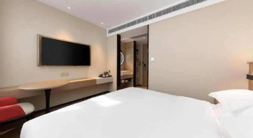 Bed in Borrman Hotel Wuhan First Hospital Hanzheng Street Metro Station