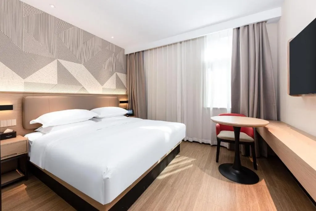 Bed in Borrman Hotel Wuhan First Hospital Hanzheng Street Metro Station