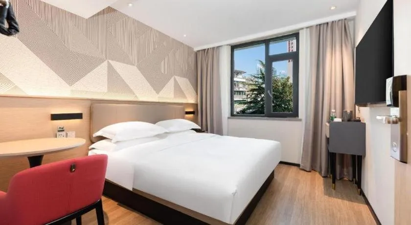 Bed in Borrman Hotel Wuhan First Hospital Hanzheng Street Metro Station