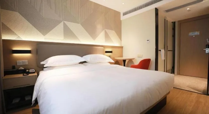 Bed in Borrman Hotel Wuhan First Hospital Hanzheng Street Metro Station