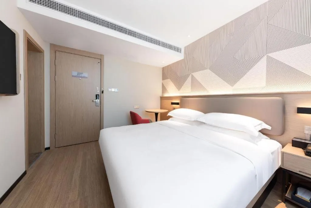 Bed in Borrman Hotel Wuhan First Hospital Hanzheng Street Metro Station