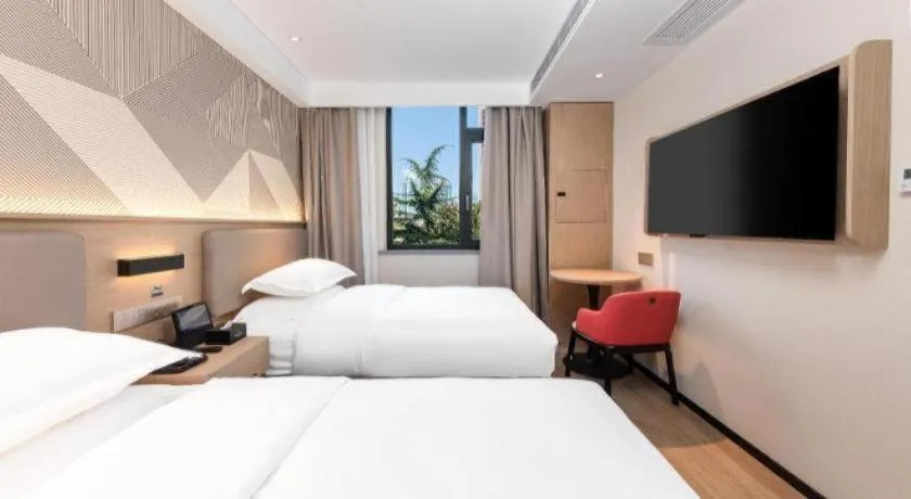 Bed in Borrman Hotel Wuhan First Hospital Hanzheng Street Metro Station