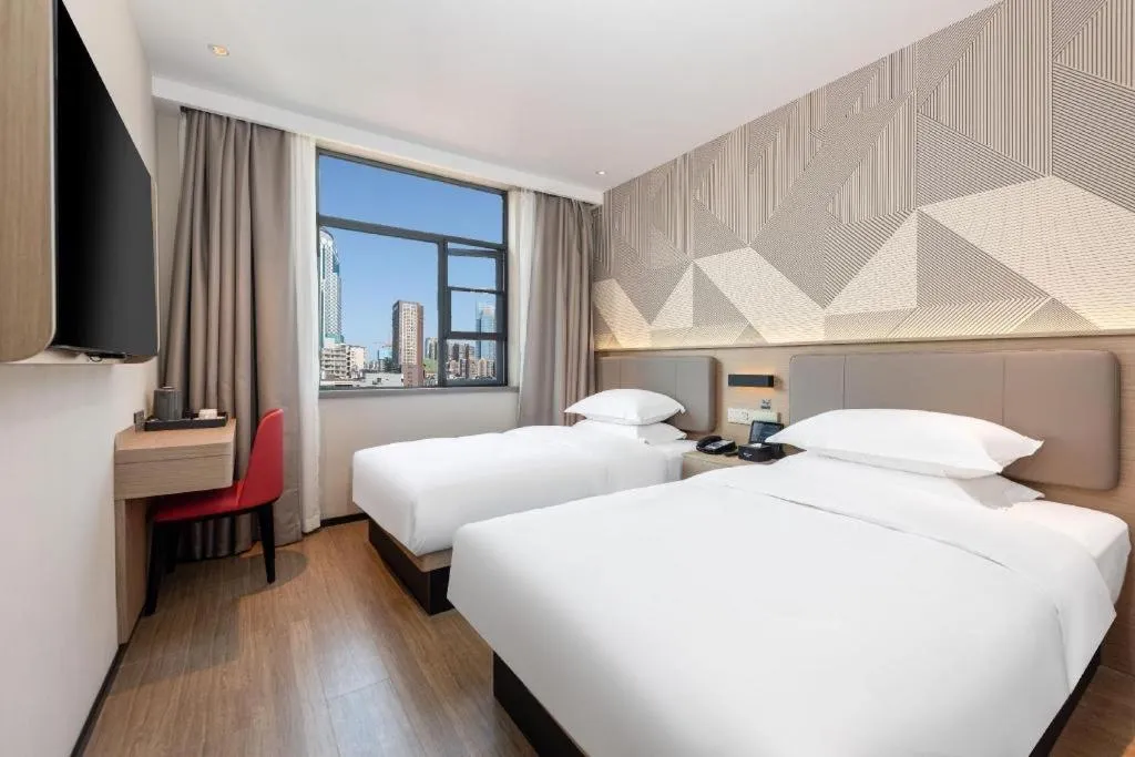 Bed in Borrman Hotel Wuhan First Hospital Hanzheng Street Metro Station