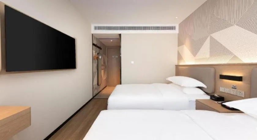 Bed in Borrman Hotel Wuhan First Hospital Hanzheng Street Metro Station