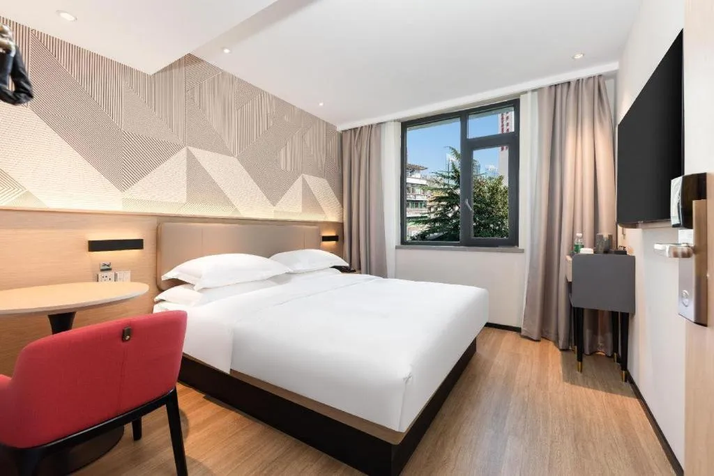 Bed in Borrman Hotel Wuhan First Hospital Hanzheng Street Metro Station