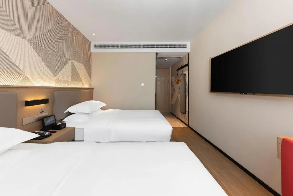 Bed in Borrman Hotel Wuhan First Hospital Hanzheng Street Metro Station