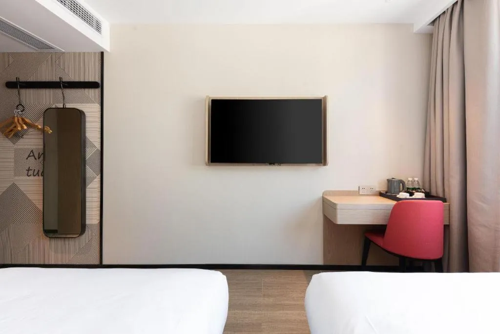 Bed in Borrman Hotel Wuhan First Hospital Hanzheng Street Metro Station