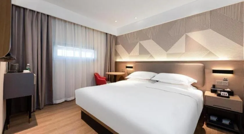 Bed in Borrman Hotel Wuhan First Hospital Hanzheng Street Metro Station