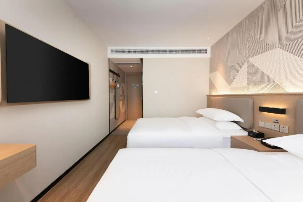 Bed in Borrman Hotel Wuhan First Hospital Hanzheng Street Metro Station