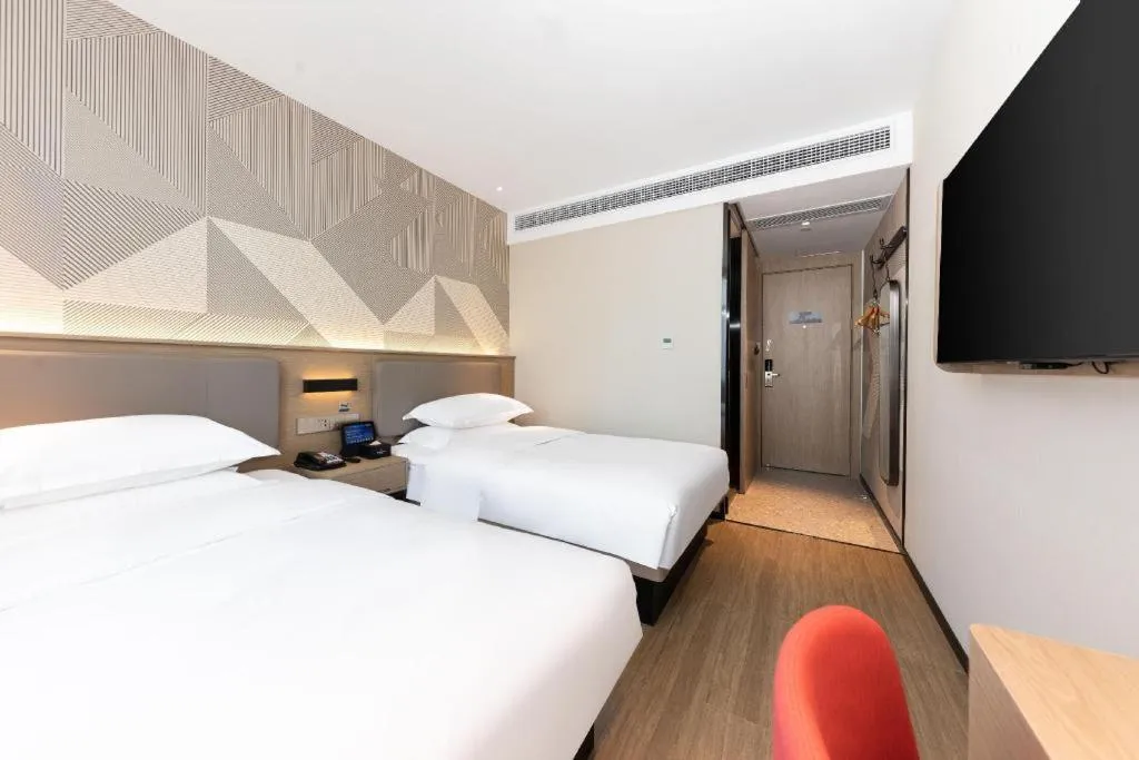 Bed in Borrman Hotel Wuhan First Hospital Hanzheng Street Metro Station