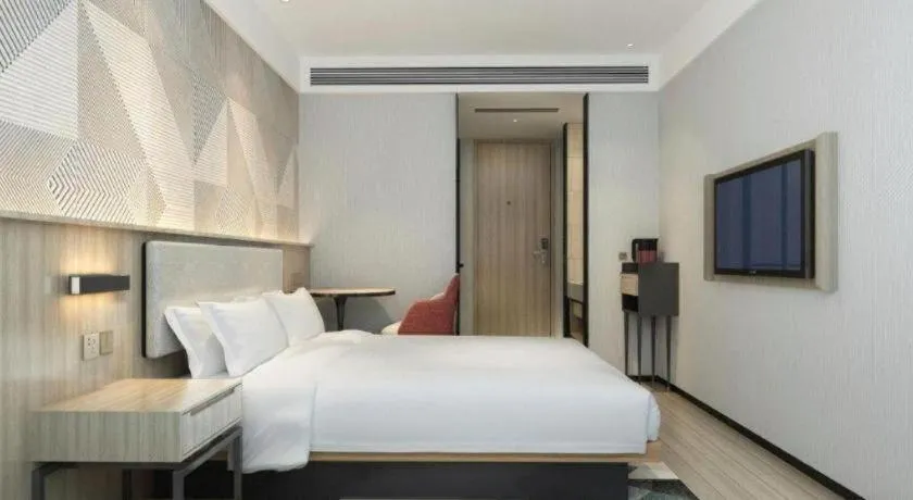 Bed in Borrman Hotel Wuhan First Hospital Hanzheng Street Metro Station