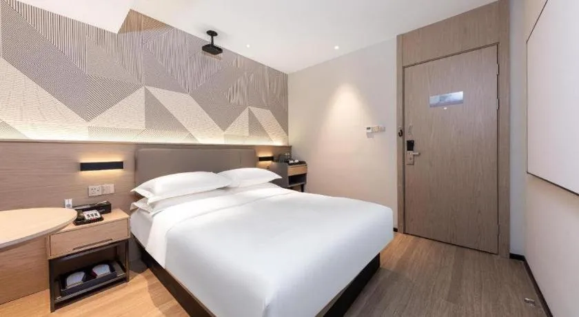 Bed in Borrman Hotel Wuhan First Hospital Hanzheng Street Metro Station