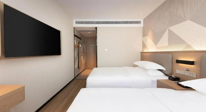 Bed in Borrman Hotel Wuhan First Hospital Hanzheng Street Metro Station